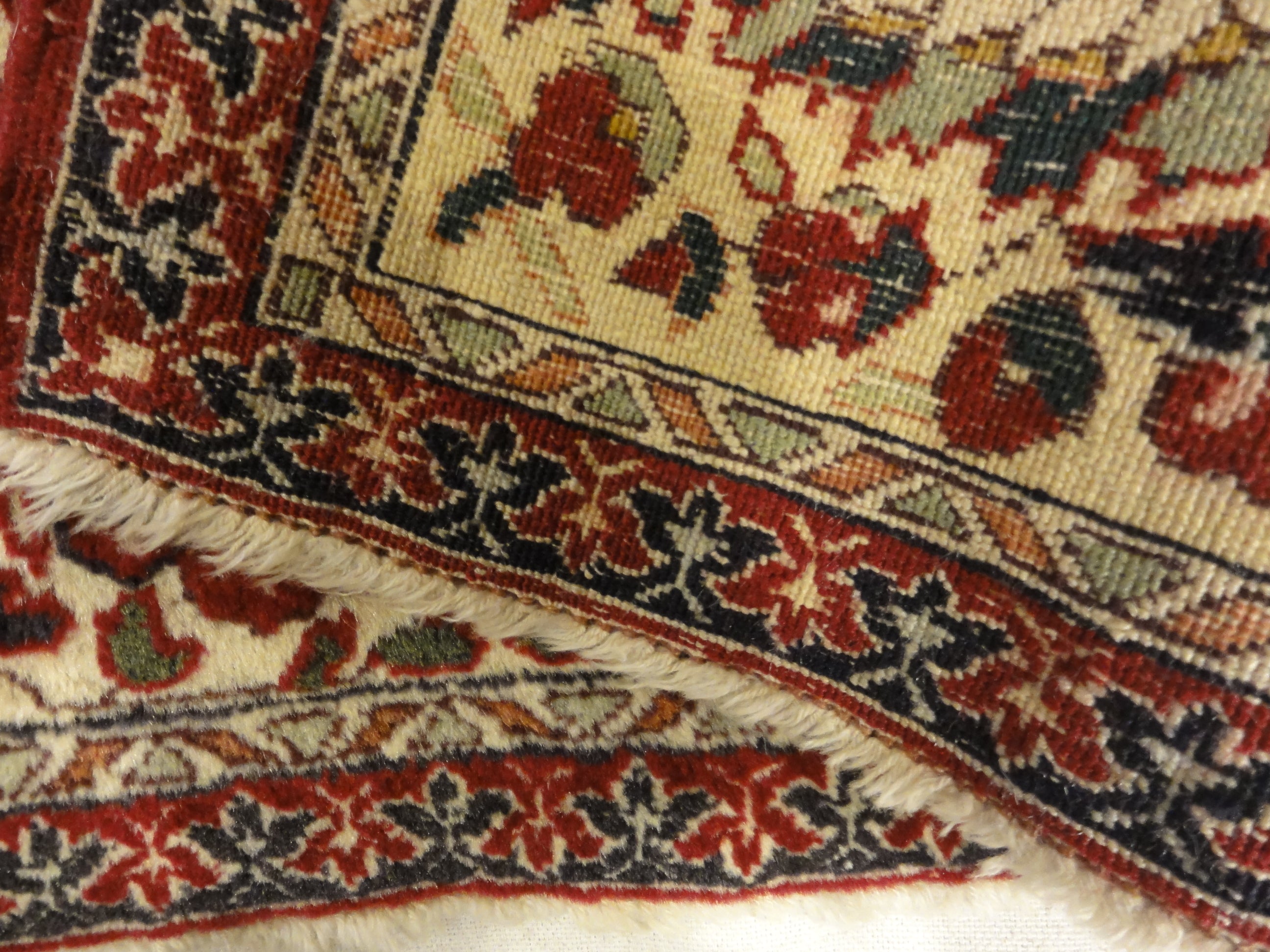 Antique Mughal Indian Emperial Rug. A piece of genuine authentic antique woven carpet art sold by Santa Barbara Design Center, Rugs and More.