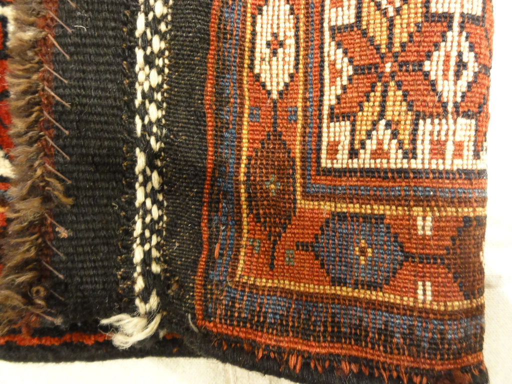 Kurdish Saddle Bag. A piece of genuine authentic antique woven carpet art sold by Santa Barbara Design Center, Rugs and More.
