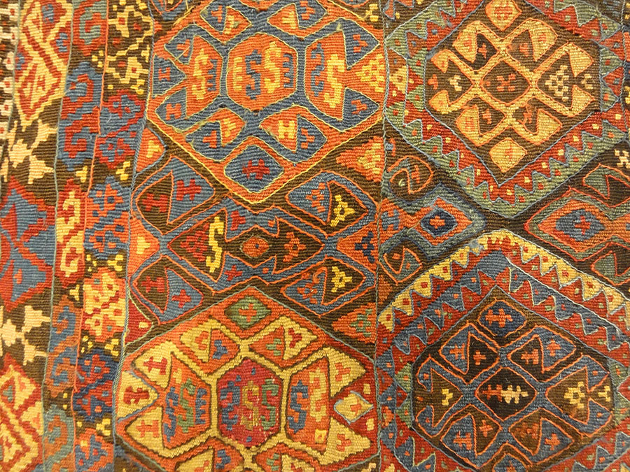 Small Bakhetiari Kelim Saddle Bag some metal threading throughout. Visit us Rugs & More in the Santa Barbara Design Center.