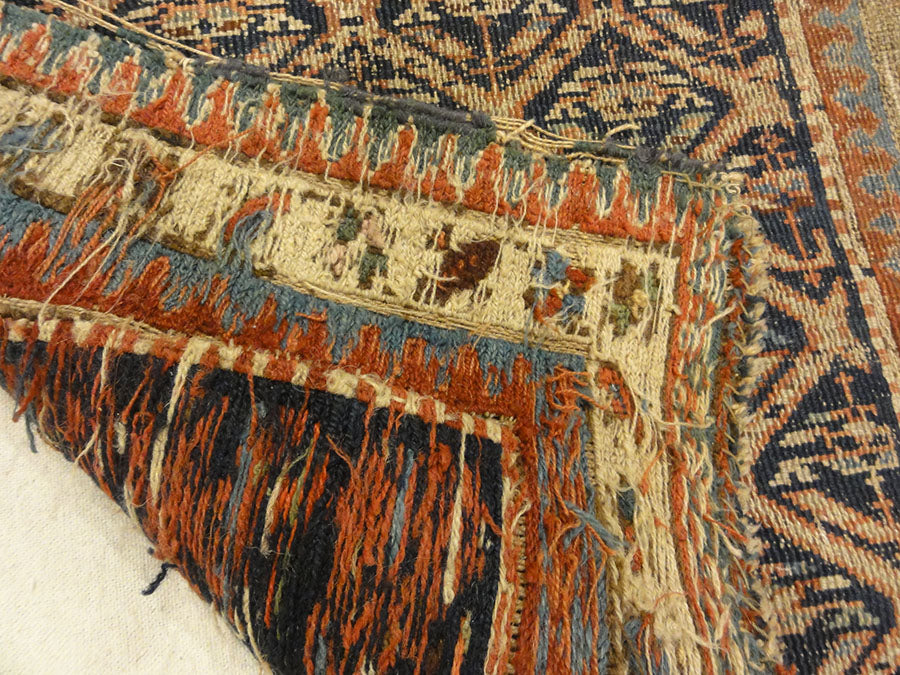Antique Soumakh Herati Rug. A piece of antique woven carpet art sold at Santa Barbara Design Center Rugs and More in Santa Barbara, California.