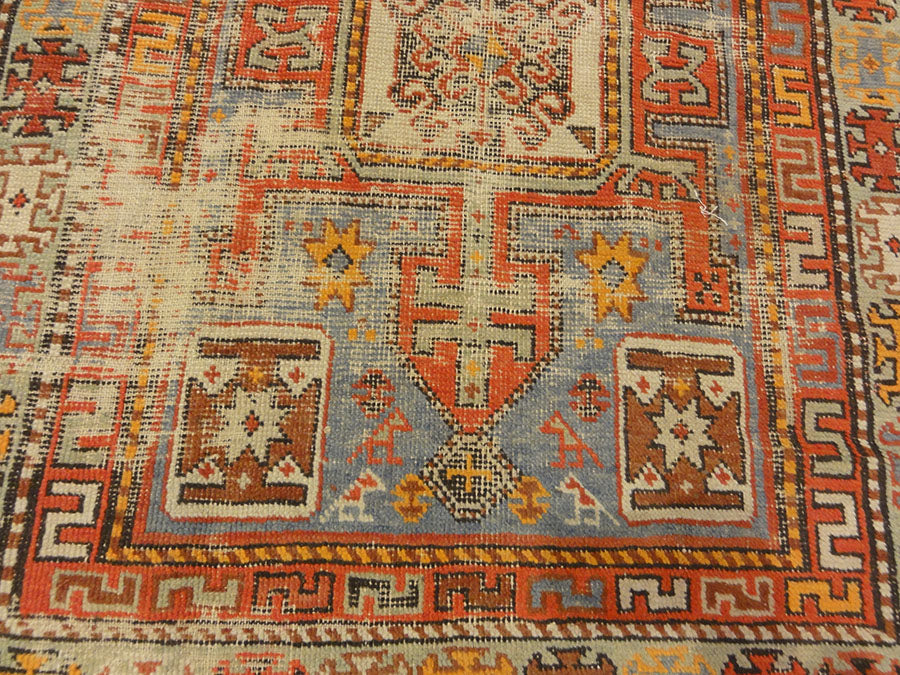 Antique Shirvan Rug. A piece of antique woven carpet art sold by the Santa Barbara Design Center Rugs and More in Santa Barbara, California.