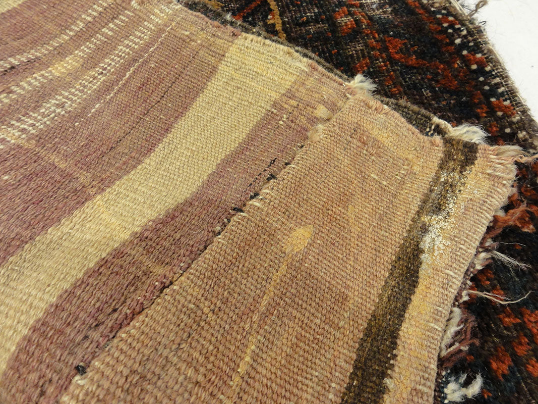 Antique Camel Hair Afghanistan Beluch. A piece of antique woven carpet art sold by Santa Barbara Design Center Rugs and More in Santa Barbara, California.
