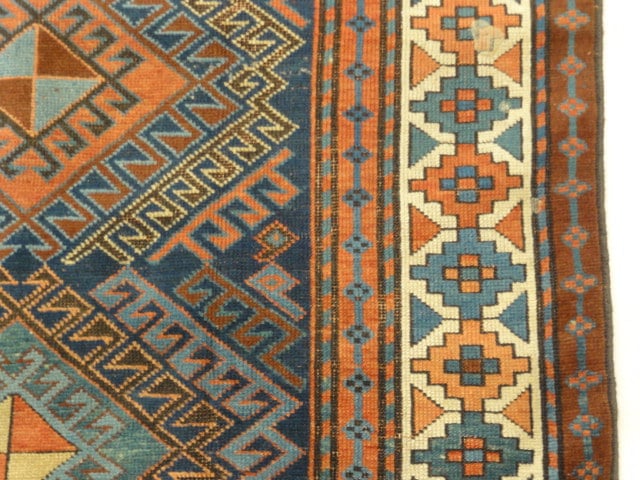 33852 Antique Kazak Rug