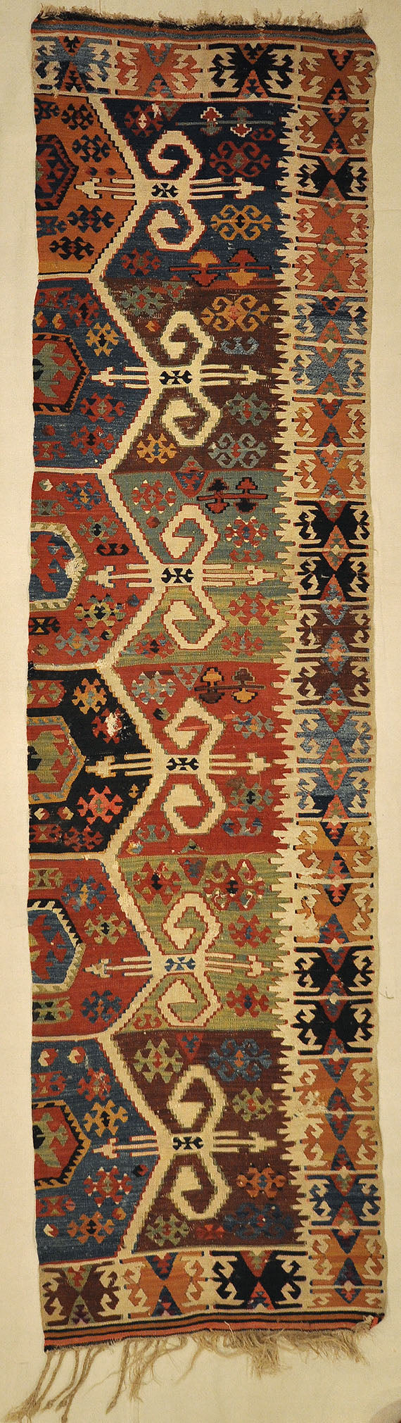 Anatolia Goddess Turkish Kelim ca Late 1700s. A piece of antique woven carpet art sold by the Santa Barbara Design Center, Rugs and More in California.