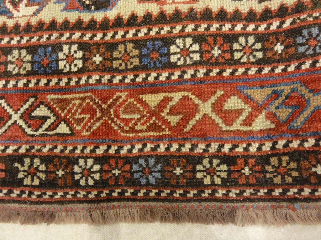 Antique Caucasian Shirvan Botteh Motif. Antique piece of woven carpet art sold by the Santa Barbara Design Center, Rugs and More in Santa Barbara, CA