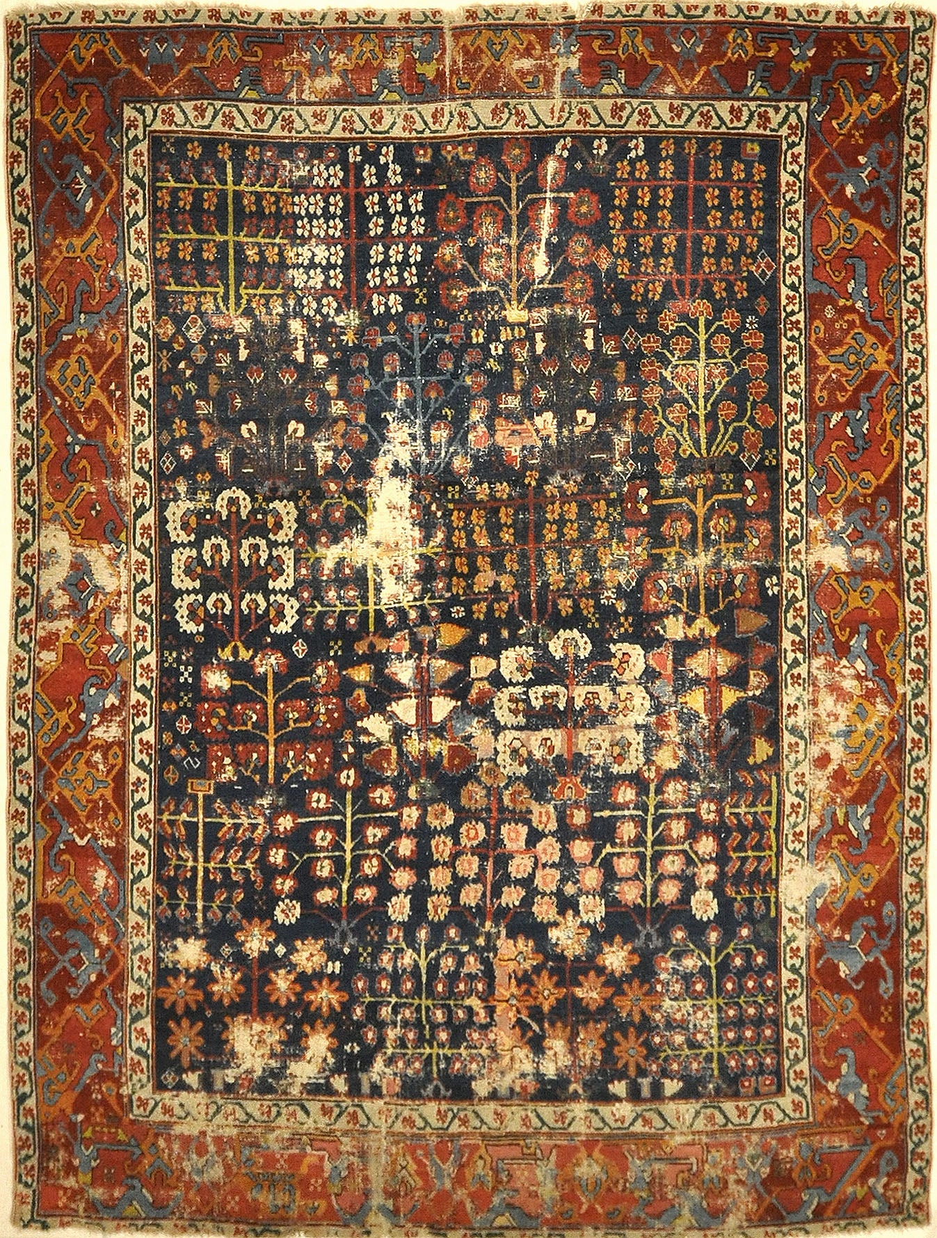 Antique Kurdish Shrub Rug Circa 17th Century A piece of genuine authentic woven carpet art sold by Santa Barbara Design Center Rugs and More.