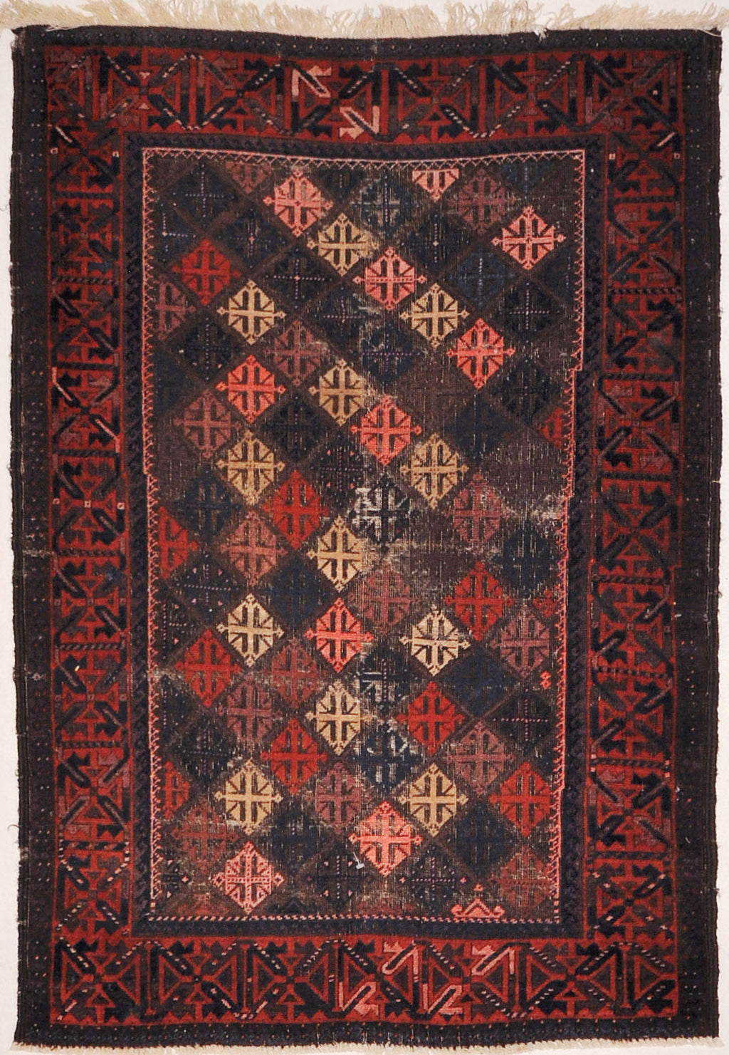 Antique Original Afghani Baluch Multicolor Diamonds A piece of genuine woven carpet art sold at Santa Barbara Design Center.