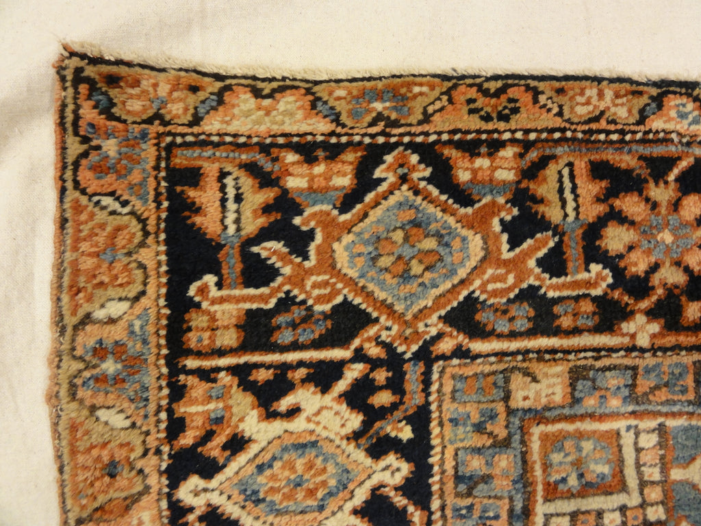 Antique Heriz Rug. A piece of genuine authentic antique woven carpet art sold by the Santa Barbara Design Center, Rugs and More.