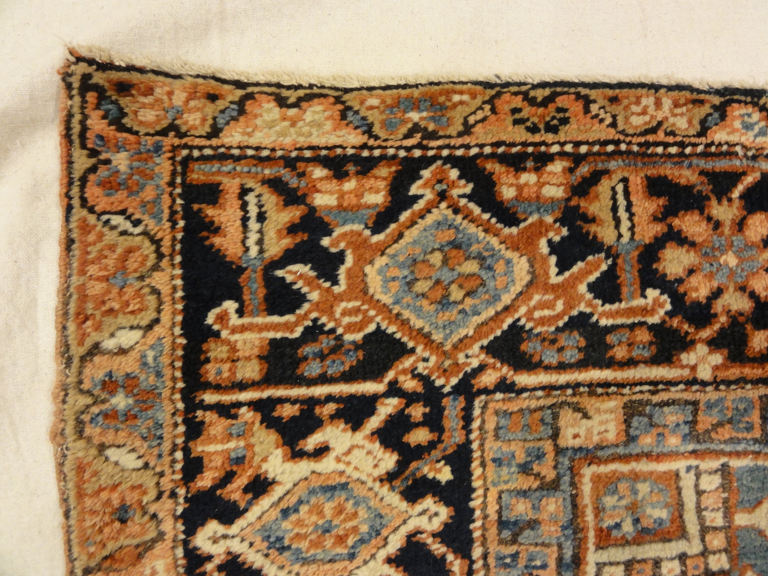 Antique Heriz Rug. A piece of genuine authentic antique woven carpet art sold by the Santa Barbara Design Center, Rugs and More.