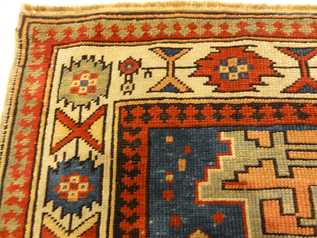 Rare Antique Leshgi Star Rug featuring Men Standing on Horses. A piece of genuine antique authentic woven carpet art sold by Santa Barbara Design Center.