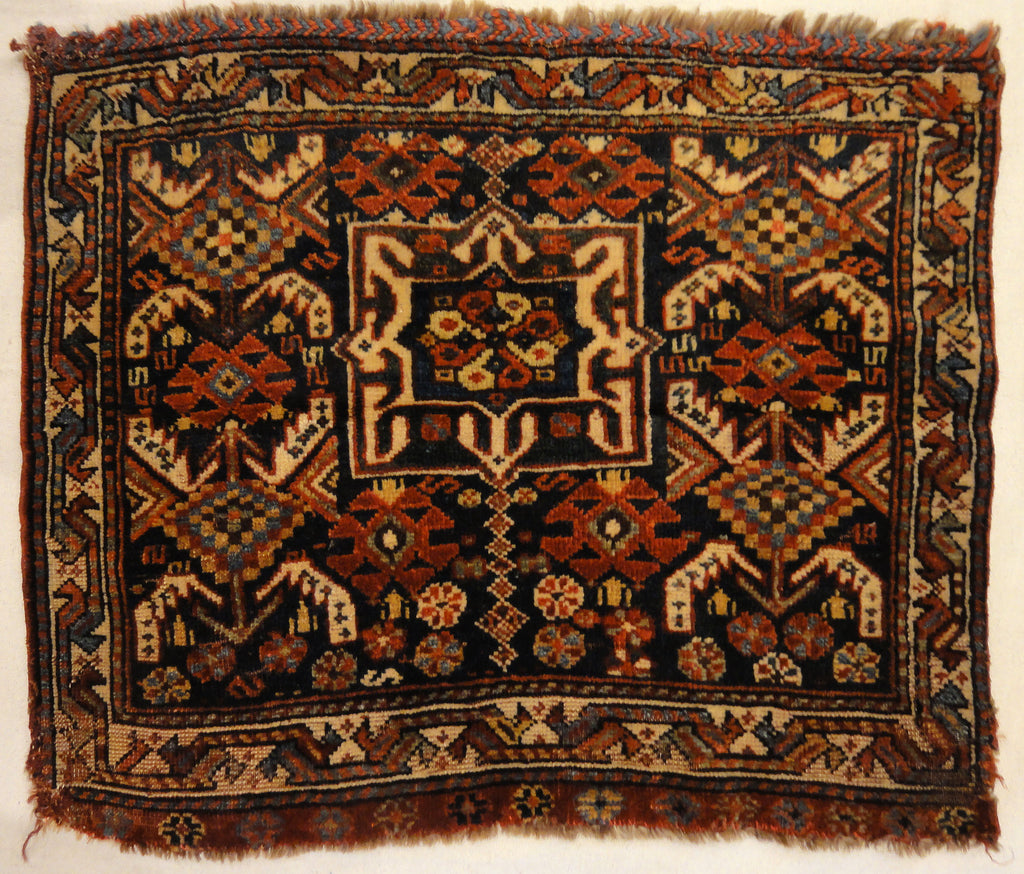 Antique Khamseh Southwest Persian Bagface. A piece of antique woven carpet art sold by Santa Barbara Design Center Rugs and More in Santa Barbara, CA.