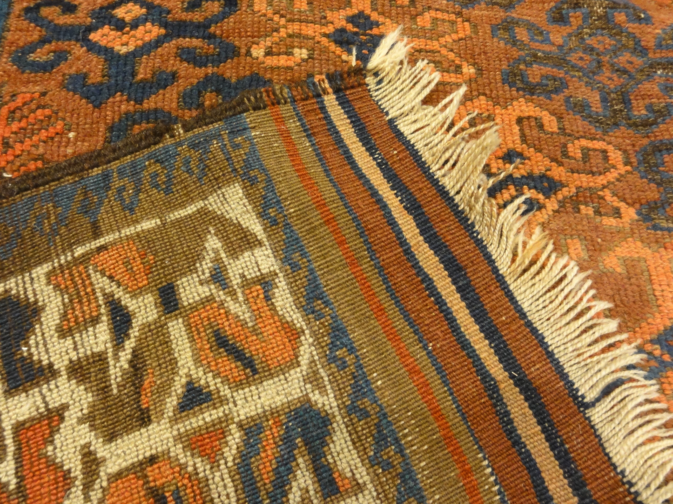 Unique Colorful Circa 1890s Beluch. A piece of genuine authentic woven carpet art sold by Santa Barbara Design Center Rugs and More.