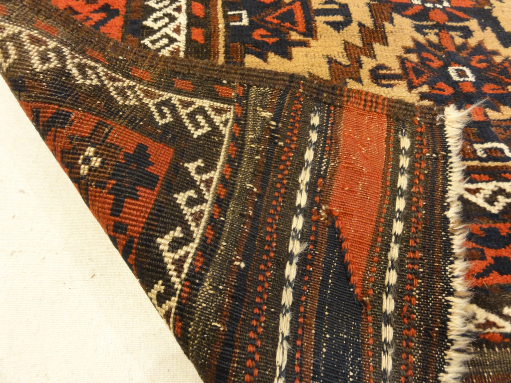 Antique Camelhair Persian Beluch Circa 1900s. A piece of genuine and authentic woven carpet art from Santa Barbara Design Center Rugs and More.