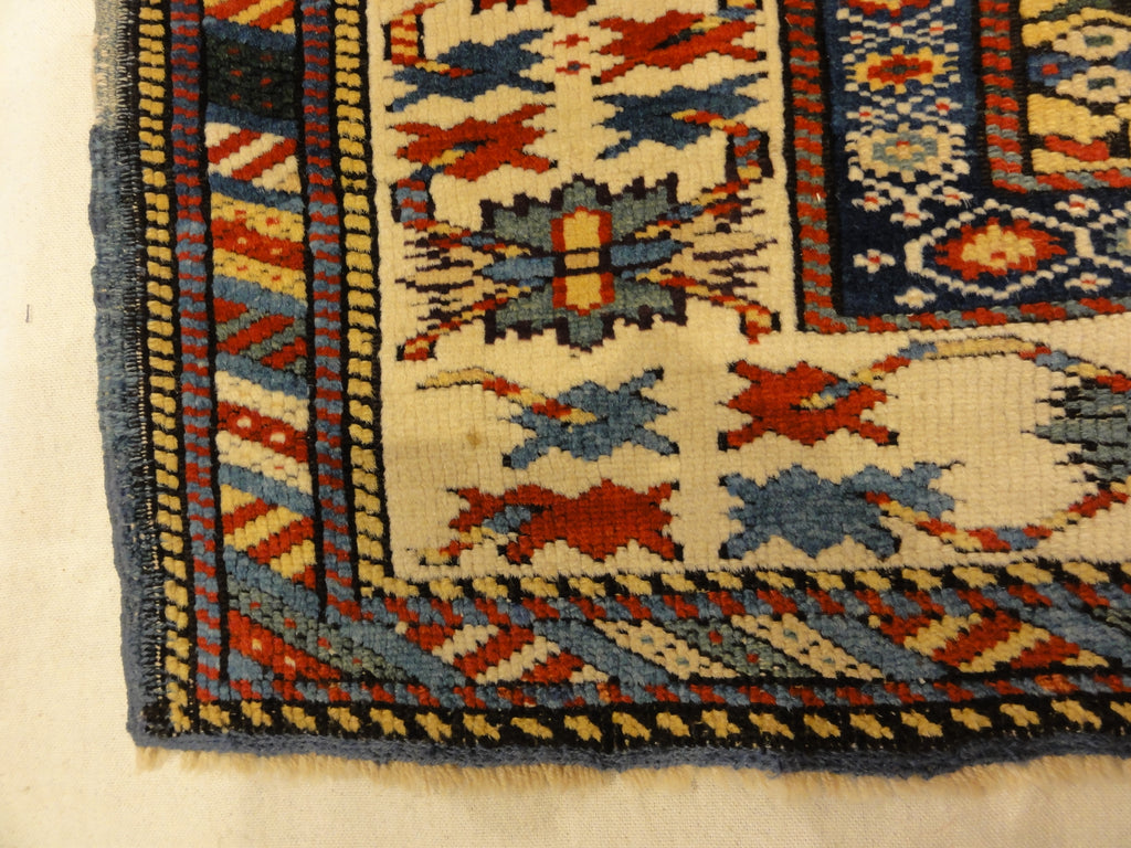 Antique Rare Gold Kuba Chichi Rug. A genuine authentic antique piece of carpet art sold by the Santa Barbara Design Center, Rugs and More.