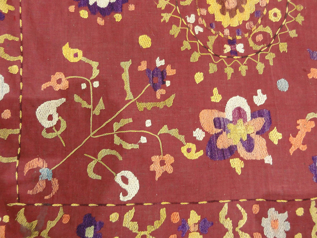 Antique Uzbek Turkestan Wool and Silk Suzani. A piece of wool and silk woven art sold by Santa Barbara Design Center Rugs and More in Santa Barbara CA.
