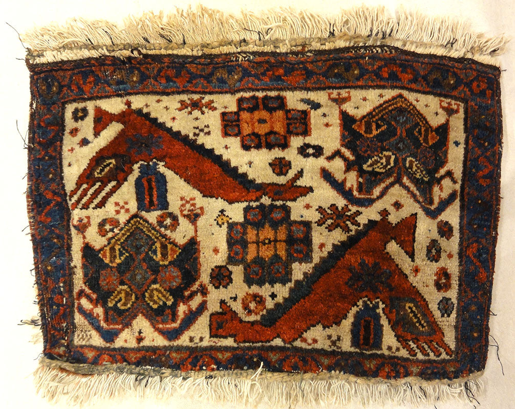 Antique Afshar Featuring Dragon and Phoenix Fight. A piece of antique woven carpet art sold by the Santa Barbara Design Center Rugs and More.