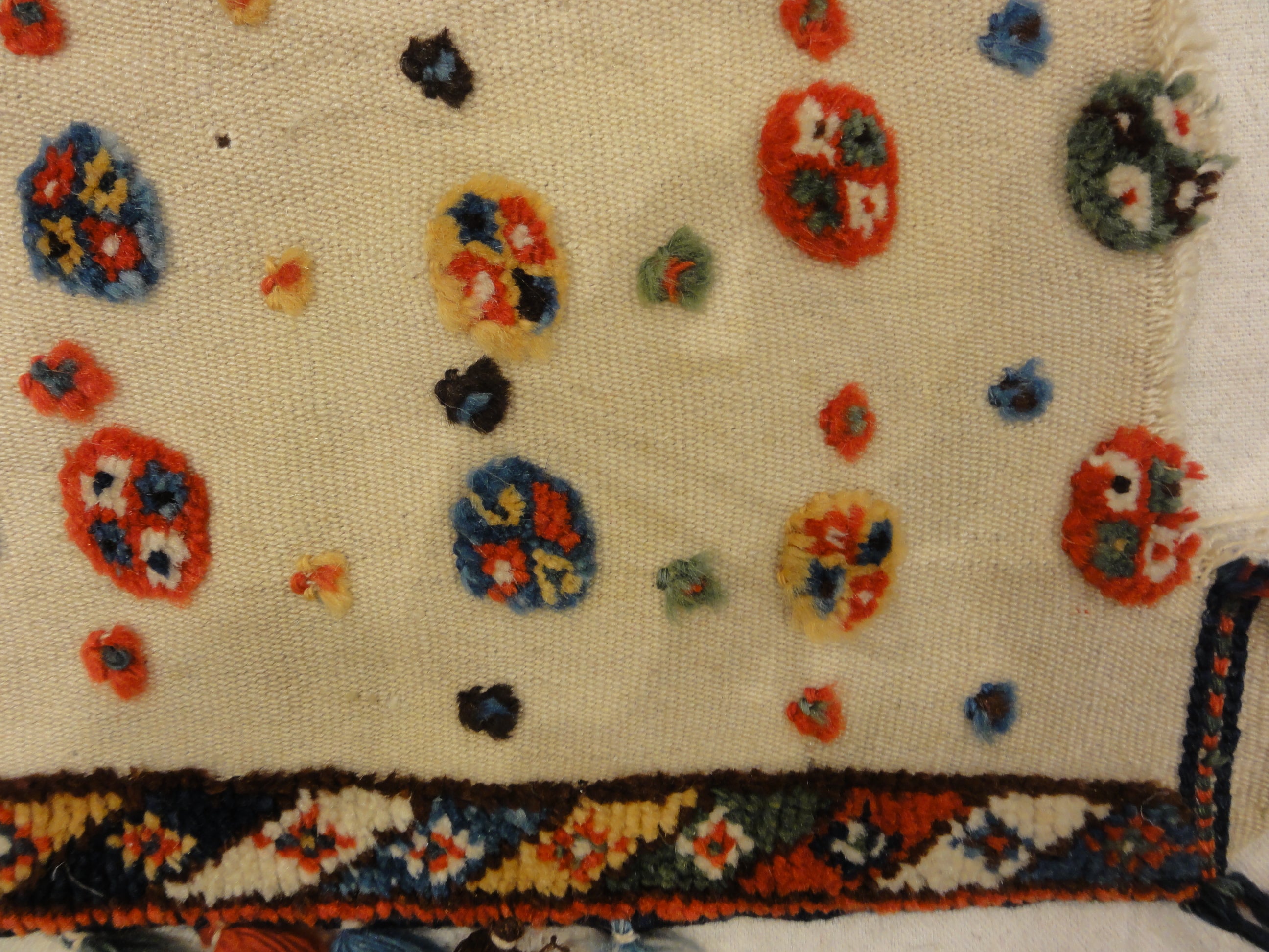 Antique Qashqai Saddle Cover. A piece of genuine authentic antique woven carpet art sold by the Santa Barbara Design Center Rugs and More.