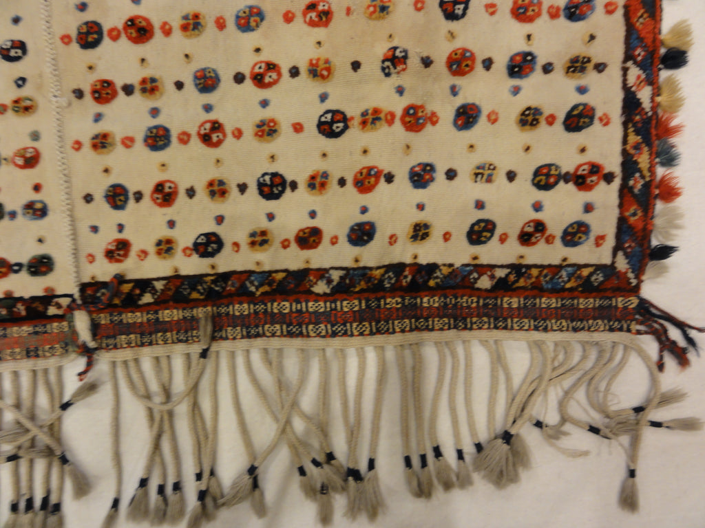 Antique Qashqai Saddle Cover. A piece of genuine authentic antique woven carpet art sold by the Santa Barbara Design Center Rugs and More.