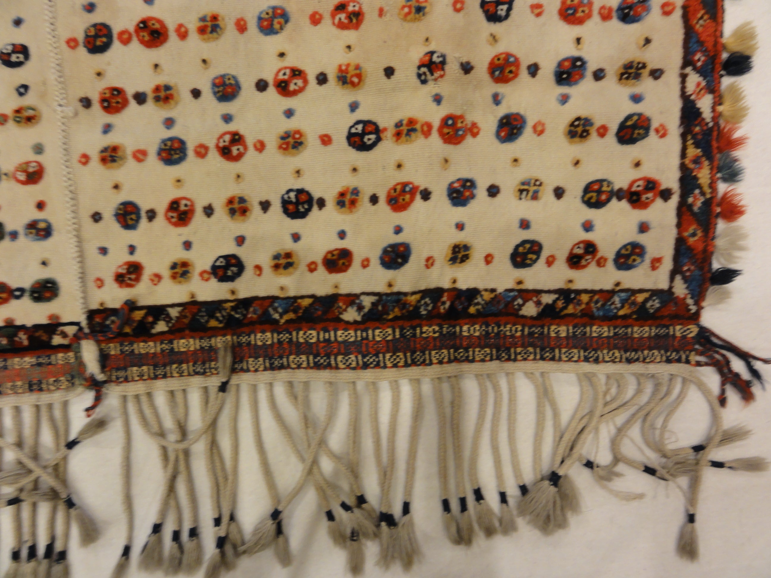 Antique Qashqai Saddle Cover. A piece of genuine authentic antique woven carpet art sold by the Santa Barbara Design Center Rugs and More.