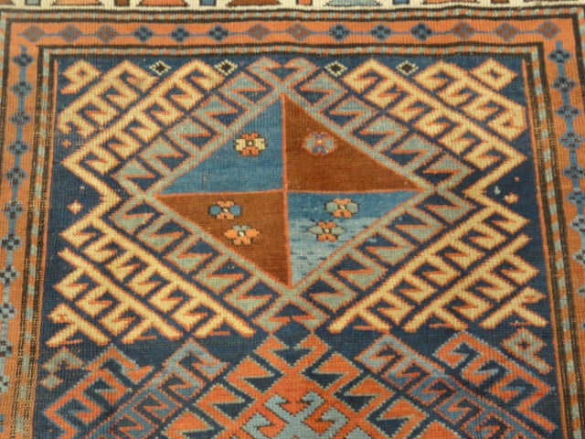 33852 Antique Kazak Rug