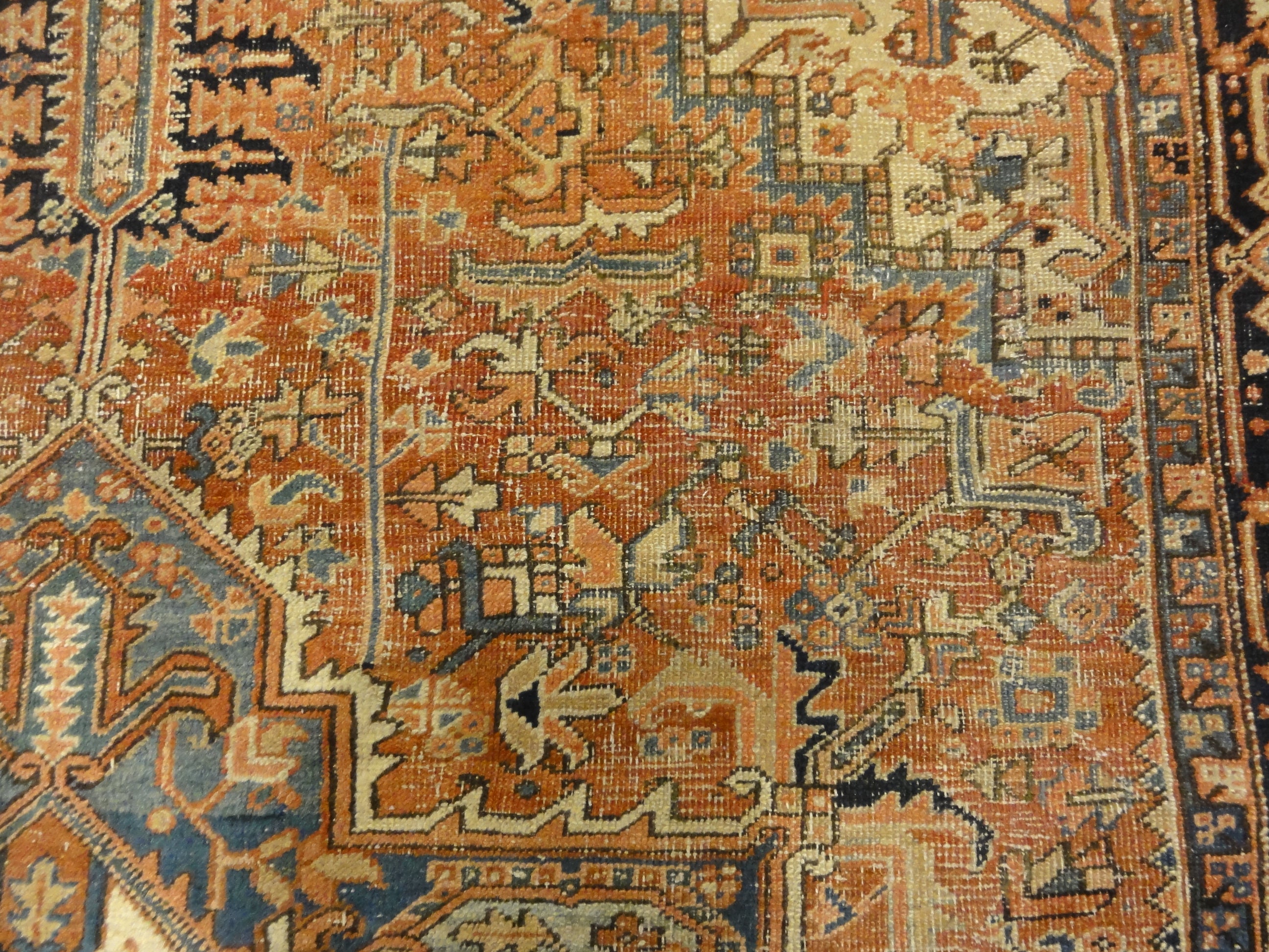 Antique Heriz Rug. A piece of genuine authentic antique woven carpet art sold by the Santa Barbara Design Center, Rugs and More.