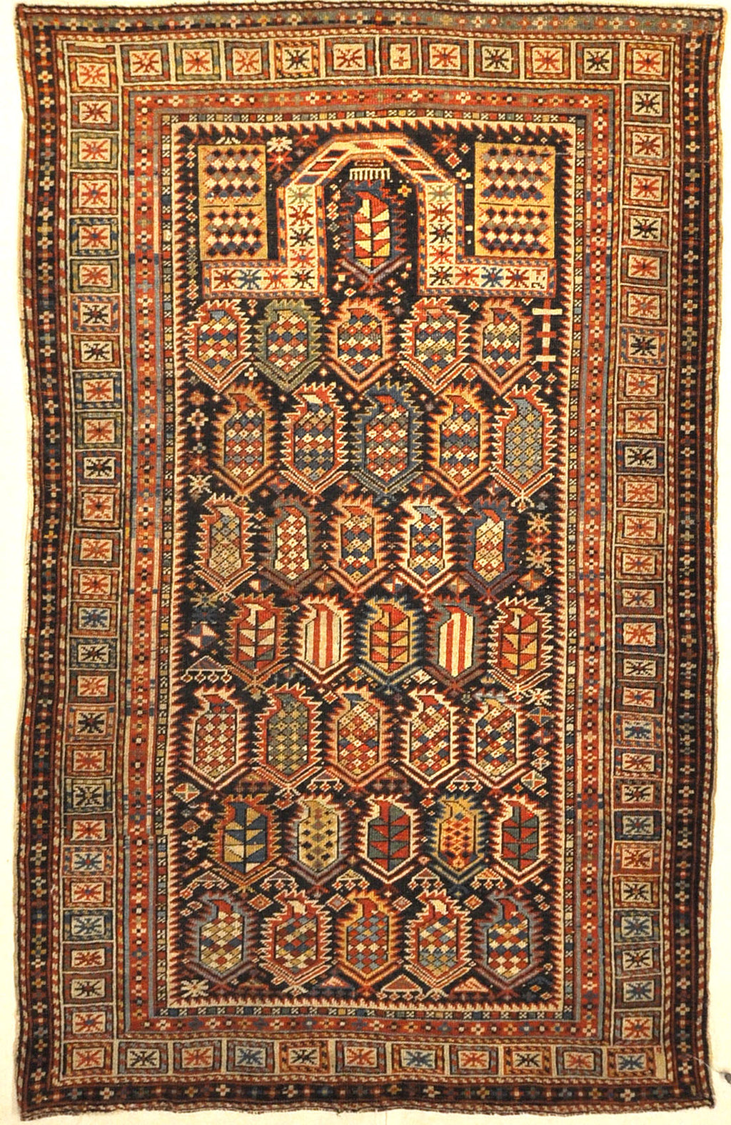 Rarest Antique Maraseli Shirvan Caucasian Prayer Rug. A piece of genuine woven carpet art sold by the Santa Barbara Design Center, Rugs and More.