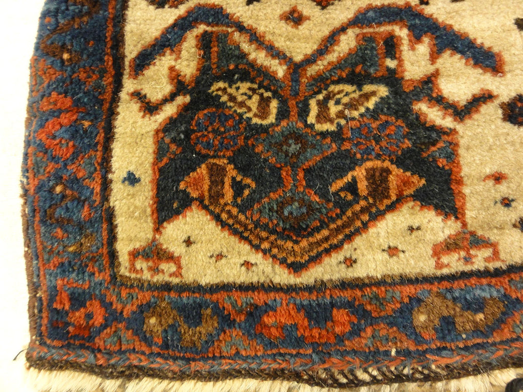 Antique Afshar Featuring Dragon and Phoenix Fight. A piece of antique woven carpet art sold by the Santa Barbara Design Center Rugs and More.