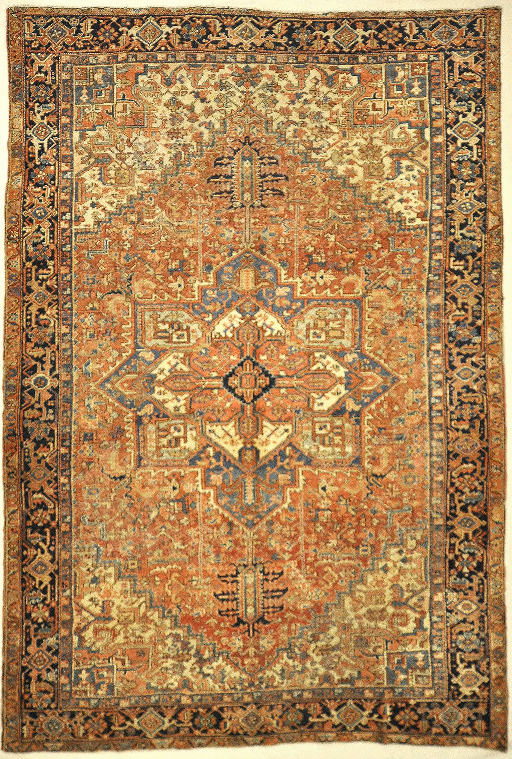 Antique Heriz Rug. A piece of genuine authentic antique woven carpet art sold by the Santa Barbara Design Center, Rugs and More.