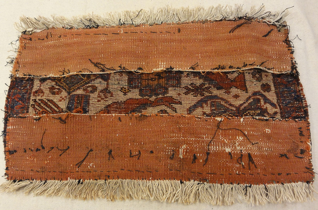 Antique Afshar Featuring Dragon and Phoenix Fight. A piece of antique woven carpet art sold by the Santa Barbara Design Center Rugs and More.