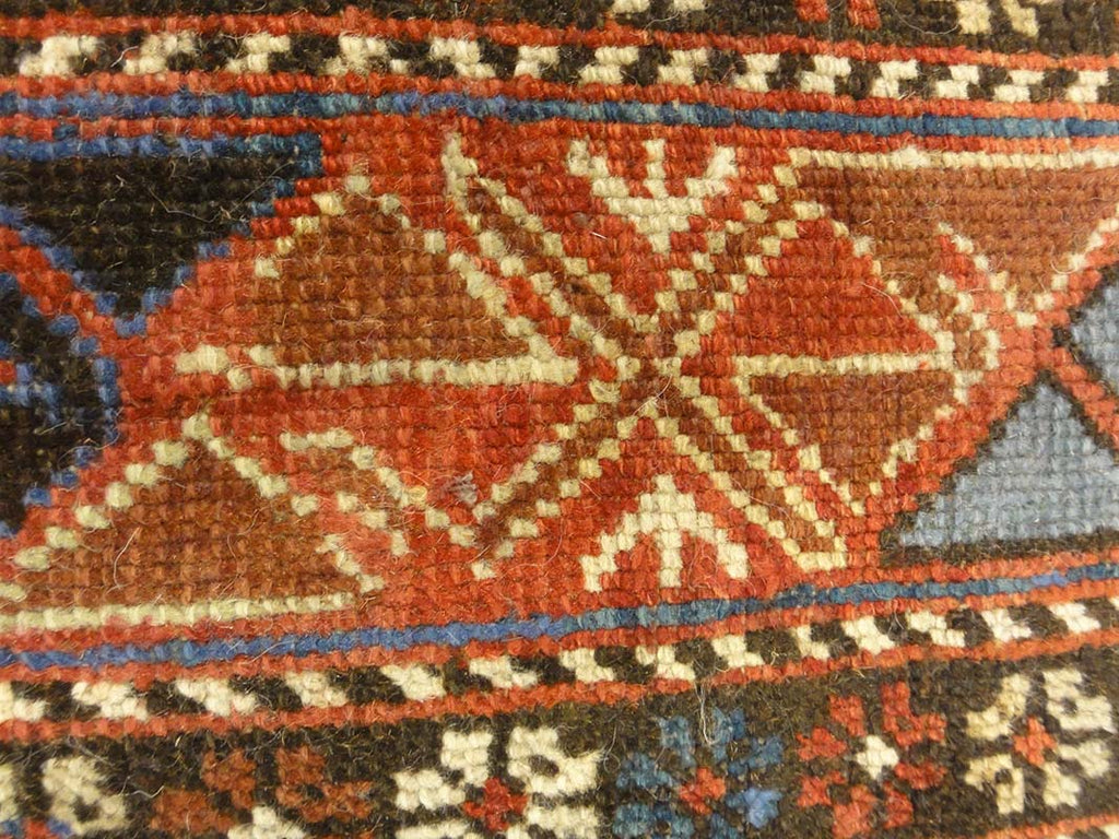 Antique Caucasian Shirvan Botteh Motif. Antique piece of woven carpet art sold by the Santa Barbara Design Center, Rugs and More in Santa Barbara, CA