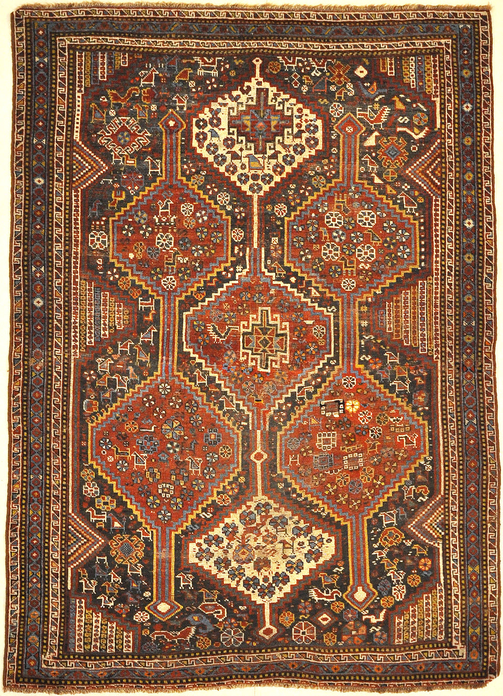 Antique Persian Khamseh Chicken Rug. A piece of genuine woven carpet art sold by Santa Barbara Design Center Rugs and More.