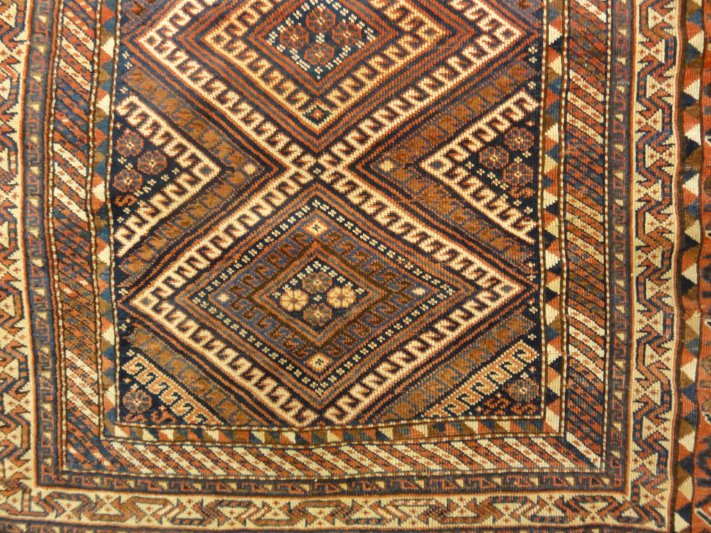 Antique Lori Persian Tribal Rug Circa 1880. A piece of genuine authentic antique woven carpet art sold by Santa Barbara Design Center Rugs and More.