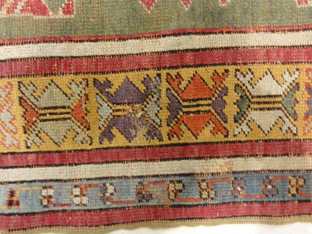 Antique Kirsehir Circa 18th Century. A piece of genuine authentic antique woven carpet art sold by Santa Barbara Design Center Rugs and More.