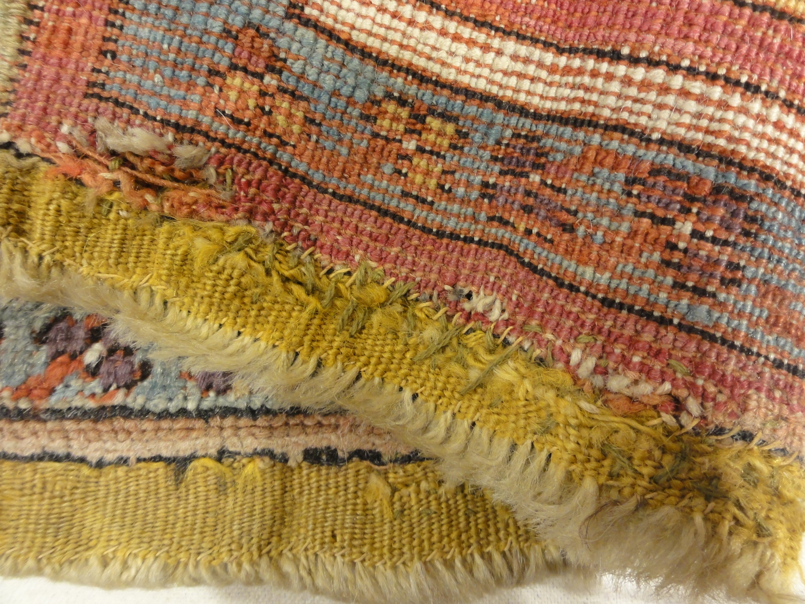 Antique Kirsehir Circa 18th Century. A piece of genuine authentic antique woven carpet art sold by Santa Barbara Design Center Rugs and More.