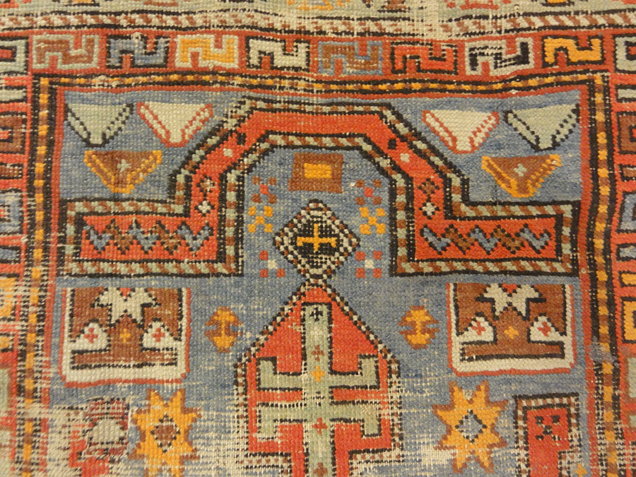Antique Shirvan Rug. A piece of antique woven carpet art sold by the Santa Barbara Design Center Rugs and More in Santa Barbara, California.