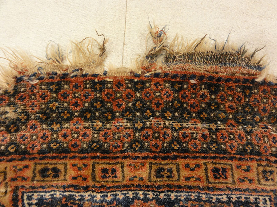Antique Kurdish West Persian Bagface with Peacocks. A piece of genuine authentic antique woven carpet art sold by Santa Barbara Design Center Rugs and More