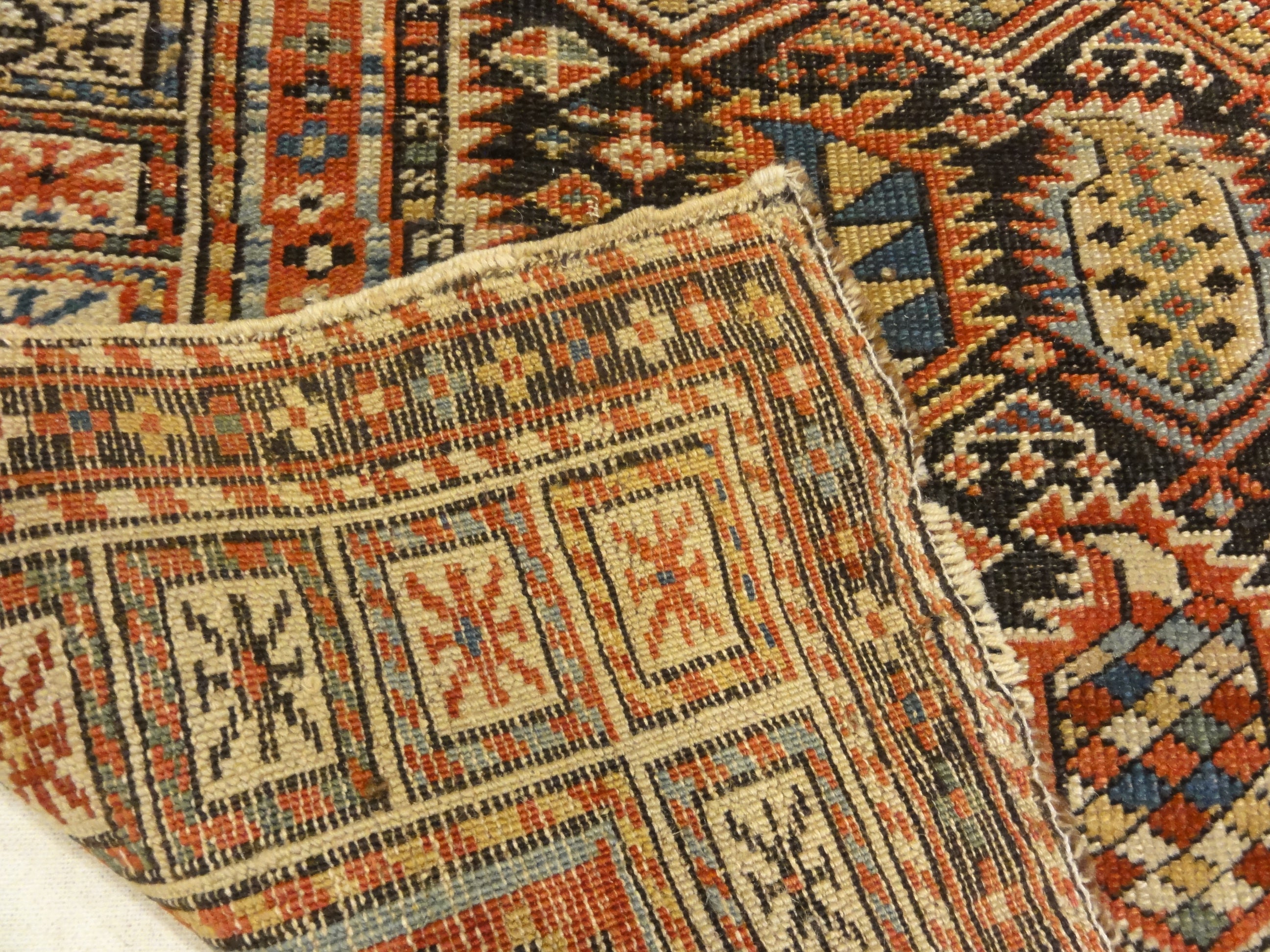 Rarest Antique Maraseli Shirvan Caucasian Prayer Rug. A piece of genuine woven carpet art sold by the Santa Barbara Design Center, Rugs and More.
