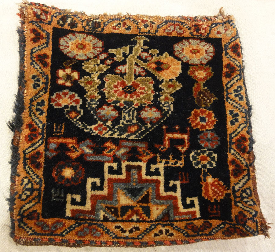 Antique Qashqai Chanteh Women's Bag. A piece of antique woven carpet art sold by Santa Barbara Design Center, Rugs and More in Santa Barbara, California.