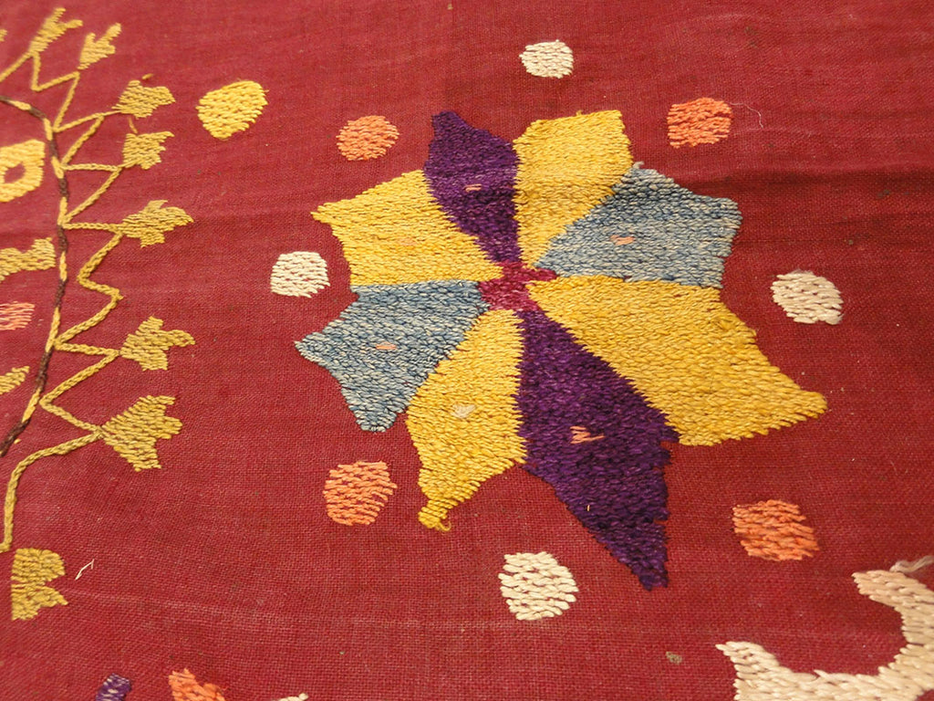 Antique Uzbek Turkestan Wool and Silk Suzani. A piece of wool and silk woven art sold by Santa Barbara Design Center Rugs and More in Santa Barbara CA.