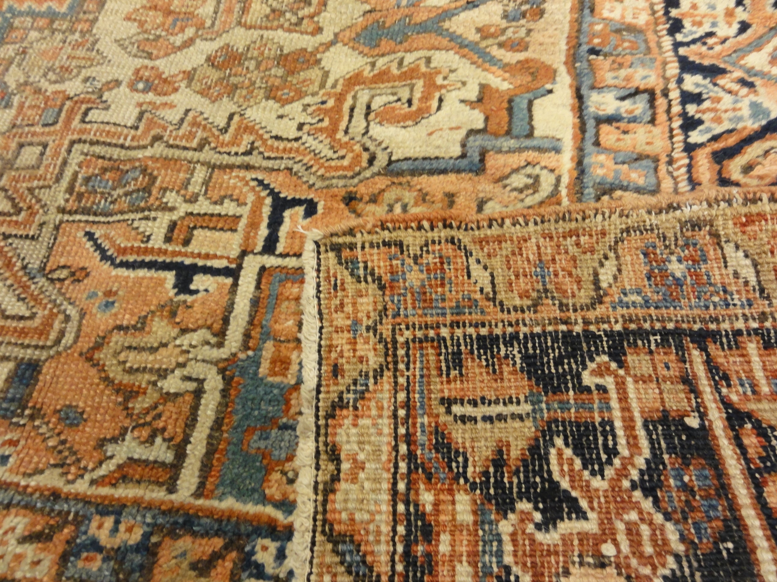 Antique Heriz Rug. A piece of genuine authentic antique woven carpet art sold by the Santa Barbara Design Center, Rugs and More.