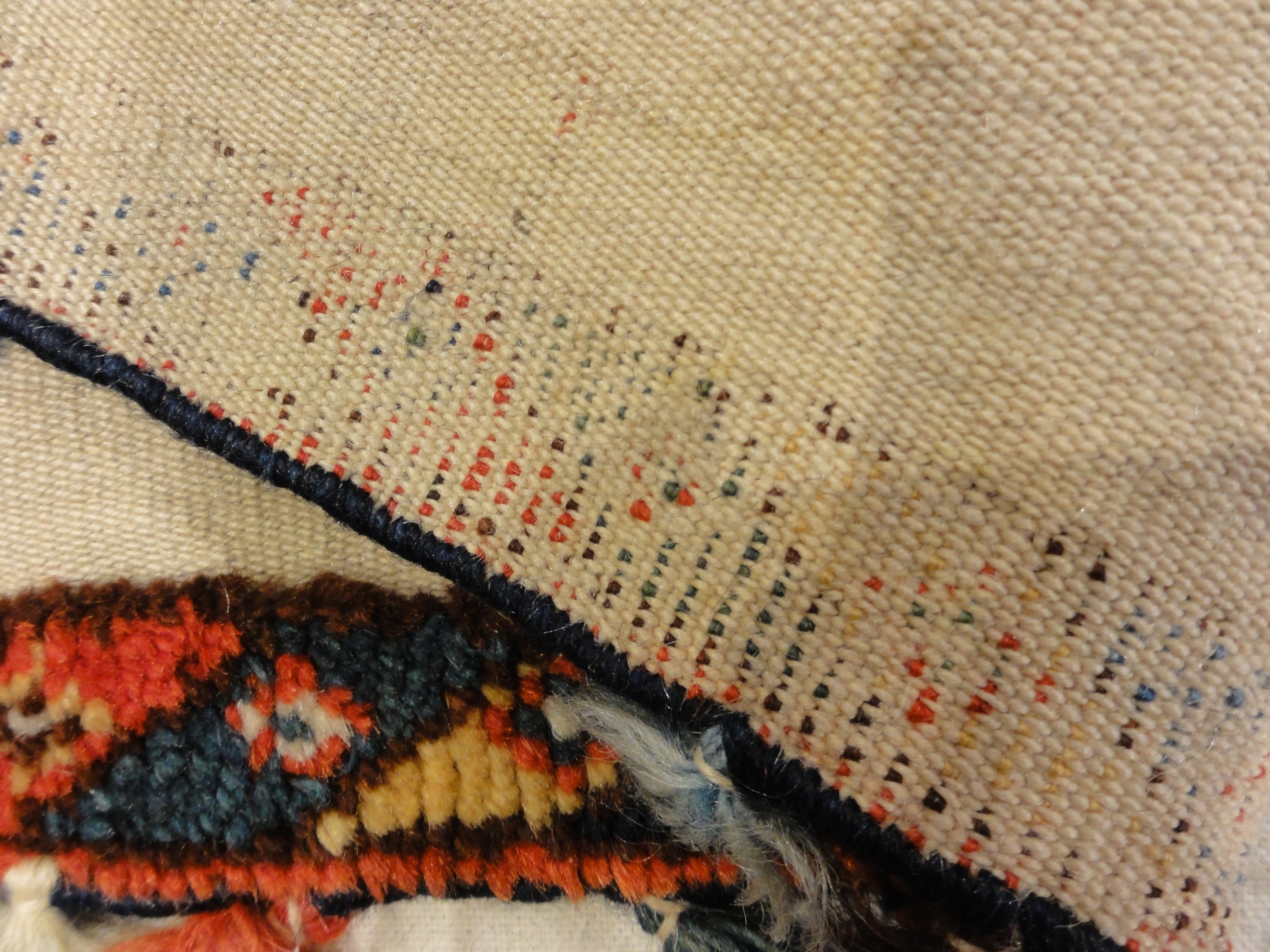 Antique Qashqai Saddle Cover. A piece of genuine authentic antique woven carpet art sold by the Santa Barbara Design Center Rugs and More.