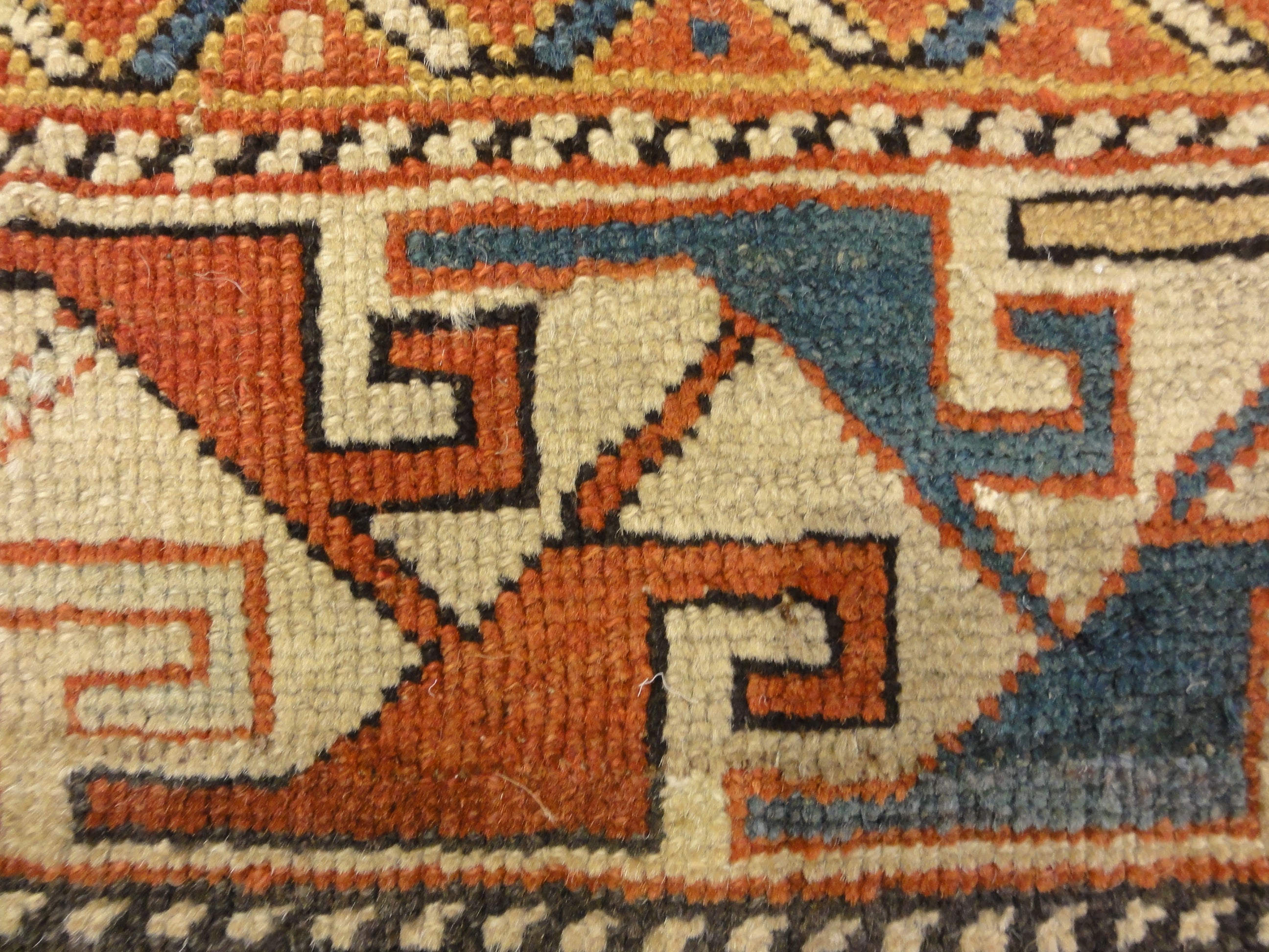 Antique Shirvan Rug Featuring Peacock and Two Men. A genuine authentic antique piece of woven carpet art sold by Santa Barbara Design Center, Rugs and More.