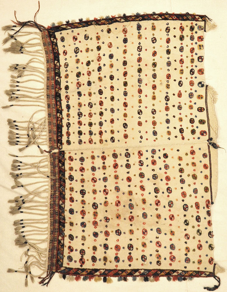 Antique Qashqai Saddle Cover. A piece of genuine authentic antique woven carpet art sold by the Santa Barbara Design Center Rugs and More.