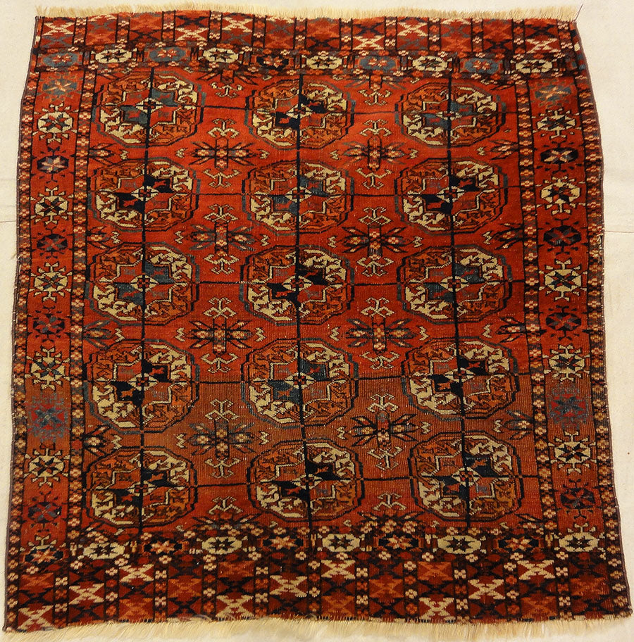 Fine Antique Tekke Bukhara Rug. A piece of genuine authentic woven carpet art sold by the Santa Barbara Design Center Rugs and More.