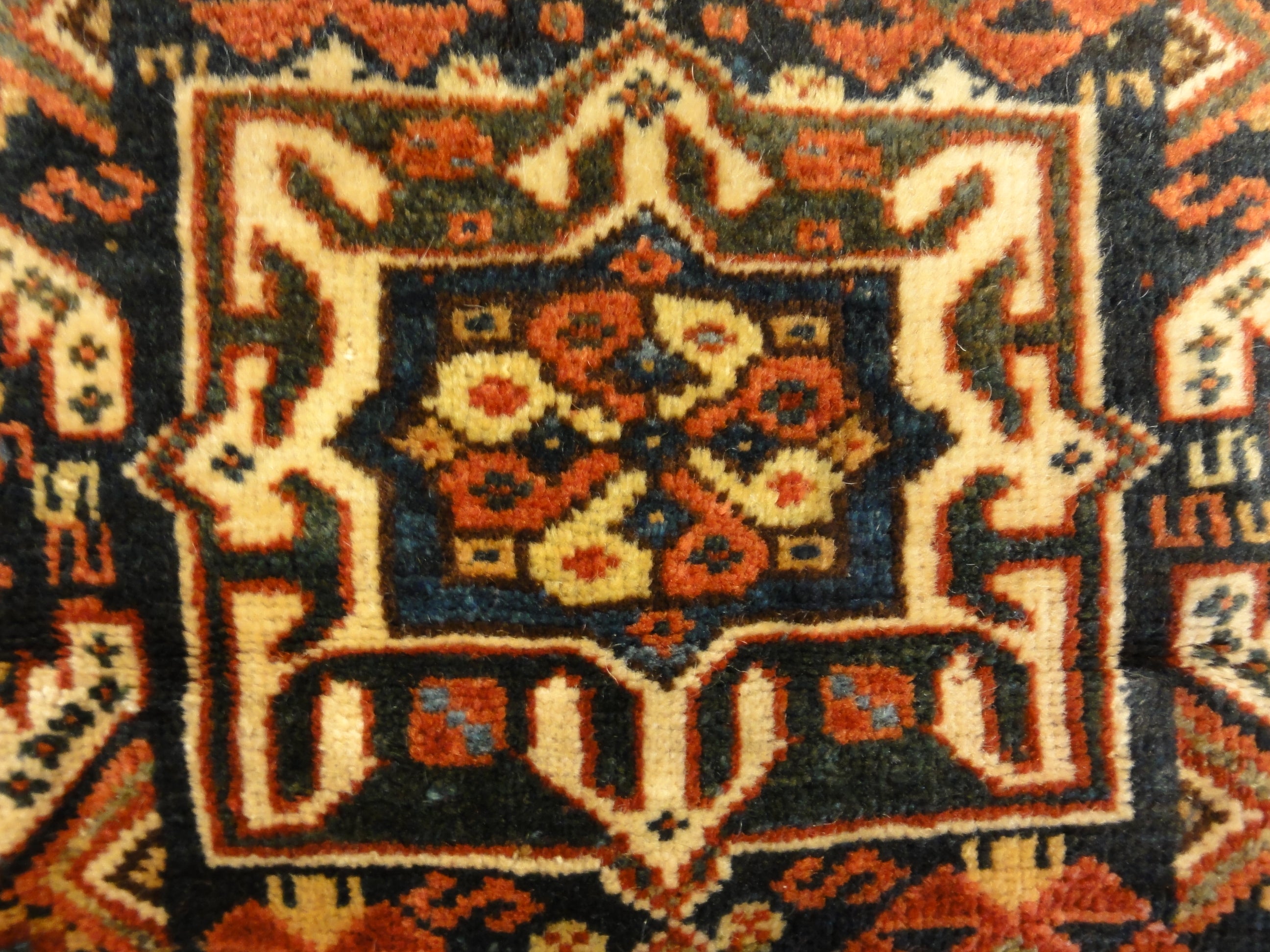 Antique Khamseh Southwest Persian Bagface. A piece of antique woven carpet art sold by Santa Barbara Design Center Rugs and More in Santa Barbara, CA.