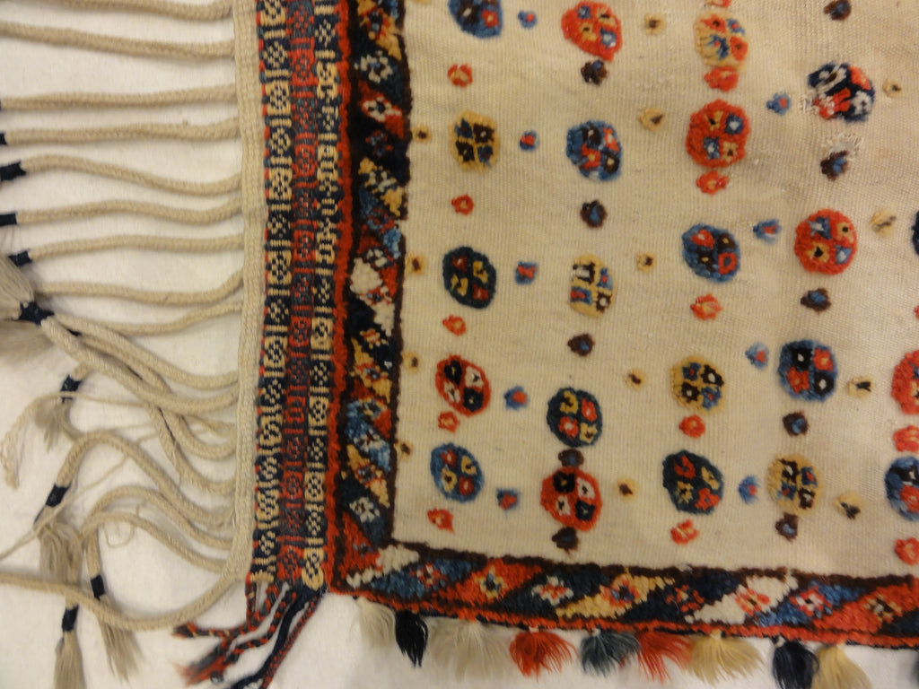 Antique Qashqai Saddle Cover. A piece of genuine authentic antique woven carpet art sold by the Santa Barbara Design Center Rugs and More.