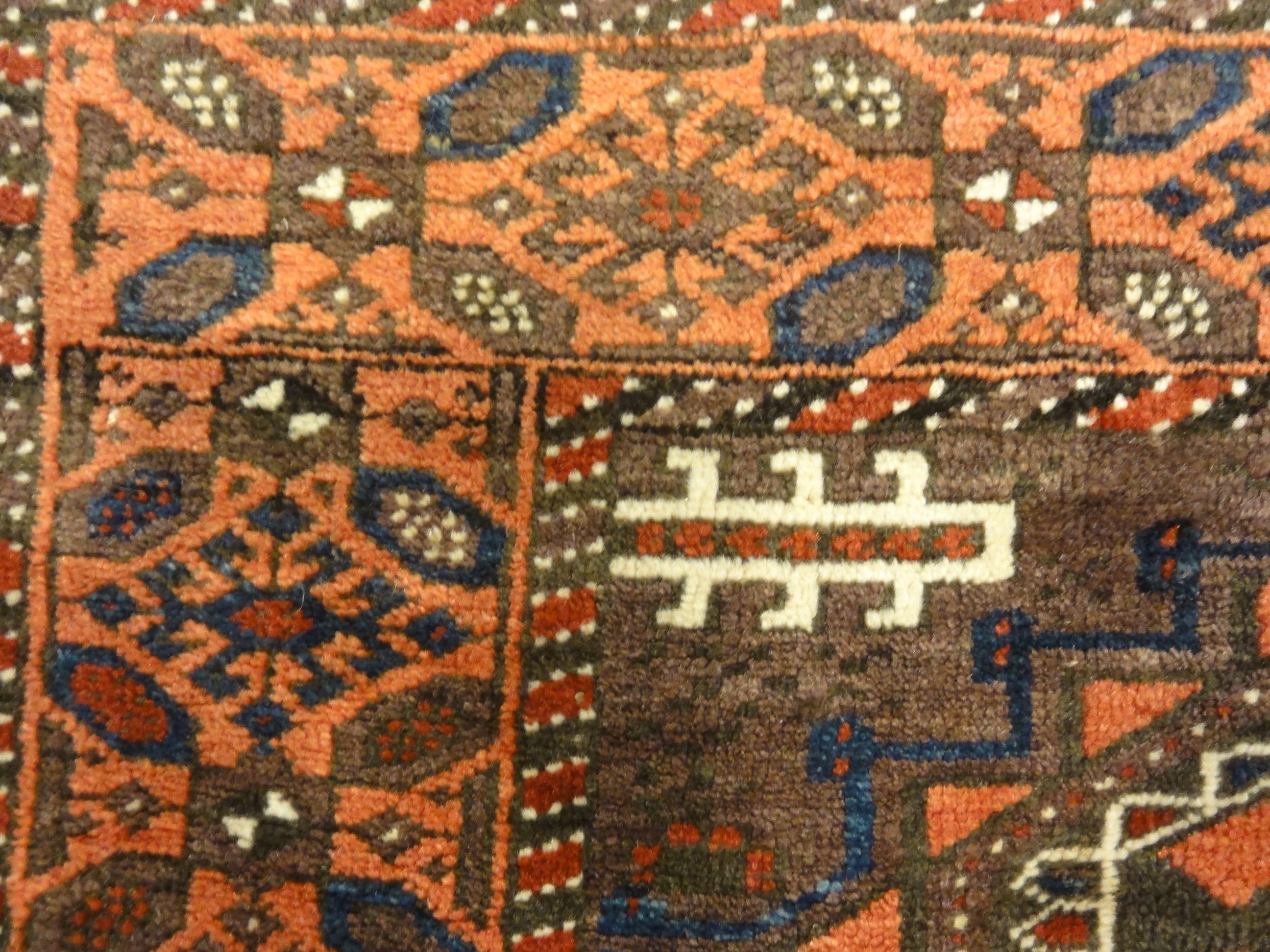 Antique Original Baluch with 3 Medallions and Unique Knotted Ends. An Afghan piece of original genuine woven carpet art sold by Santa Barbara Design Center.