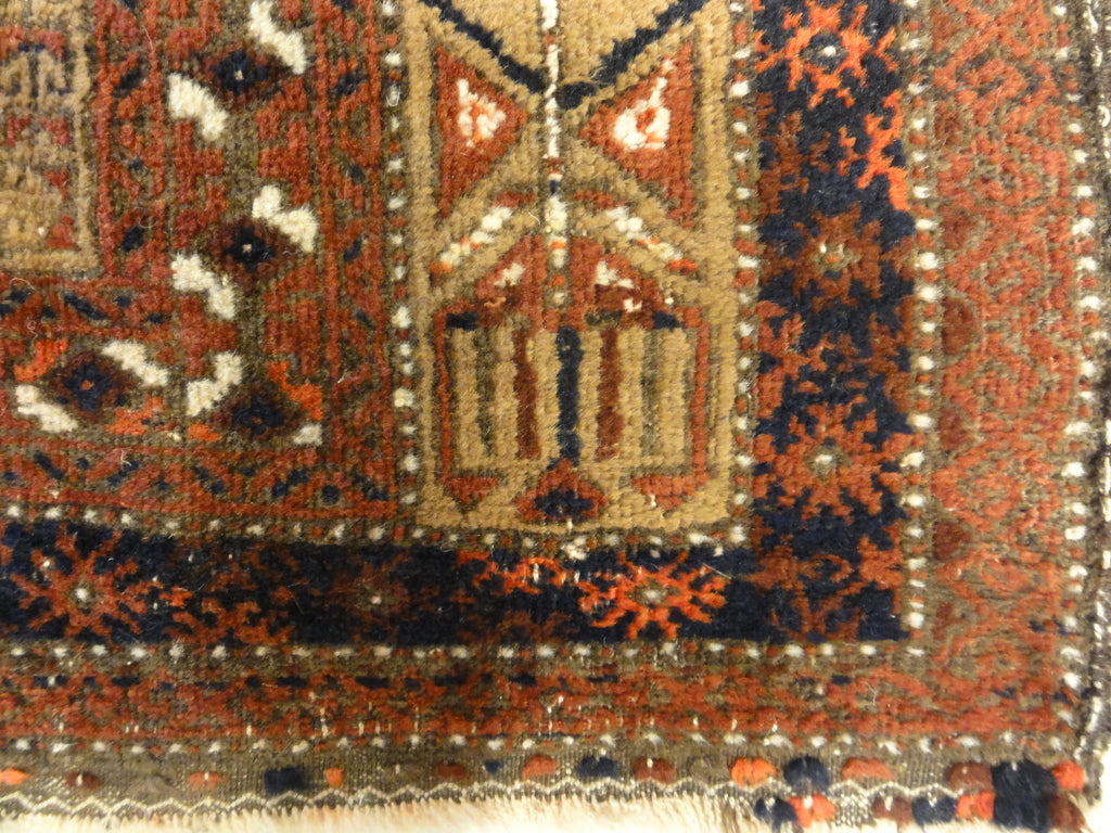 An antique, original Persian Baluch rug. A piece of genuine and authentic carpet art sold at Santa Barbara Design Center. Rugs and More.