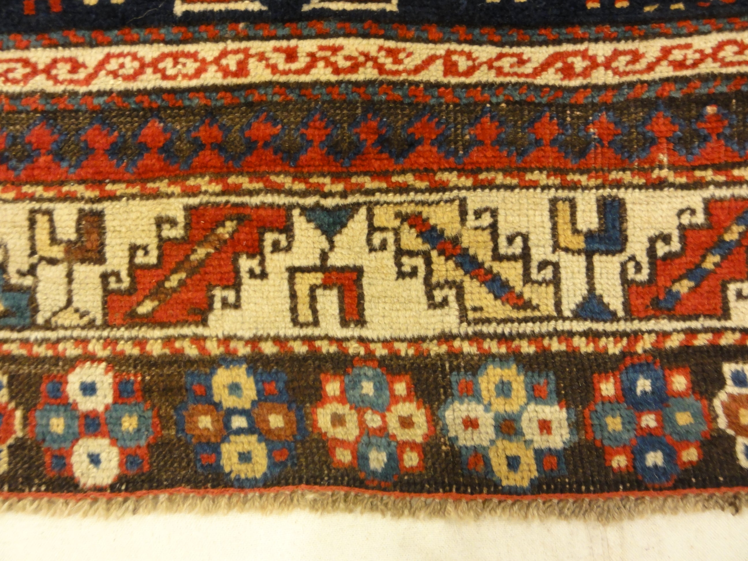 Caucasian Marriage Rug From 1880s. A piece of genuine antique woven carpet art sold by the Santa Barbara Design Center, Rugs and More.