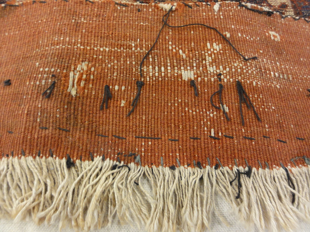 Antique Afshar Featuring Dragon and Phoenix Fight. A piece of antique woven carpet art sold by the Santa Barbara Design Center Rugs and More.